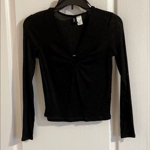 Knit sweater with ring in the middle